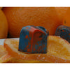 Hand-painted chocolate filled with orange and cardamon infused ganache
