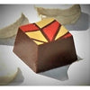 A bananas foster chocolate filled with Creme de Banana flambeed in our signature caramel ganache.