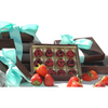 A box of hand-painted chocolate filled with a blend of strawberry and chocolate ganache