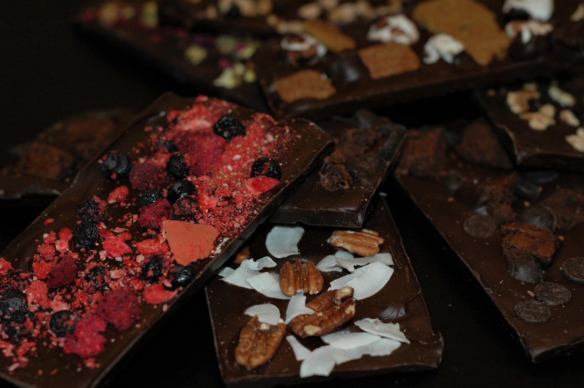 A display of chocolate barks with different toppings