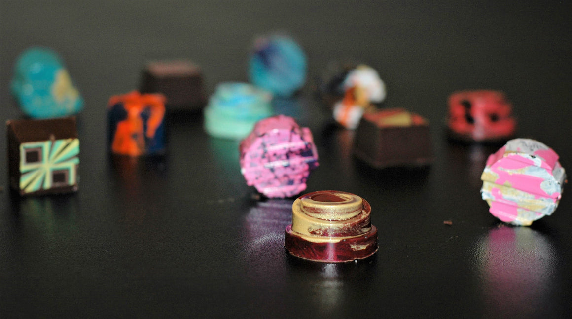 A variety of Bruges hand-painted artisan chocolate flavors